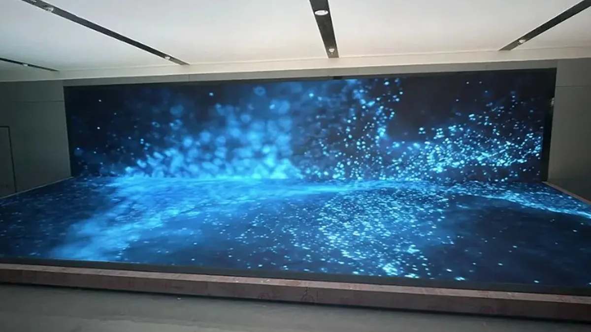 Shanghai P1.5 COB Beta LED sand table and wall installation with immersive particle graphics