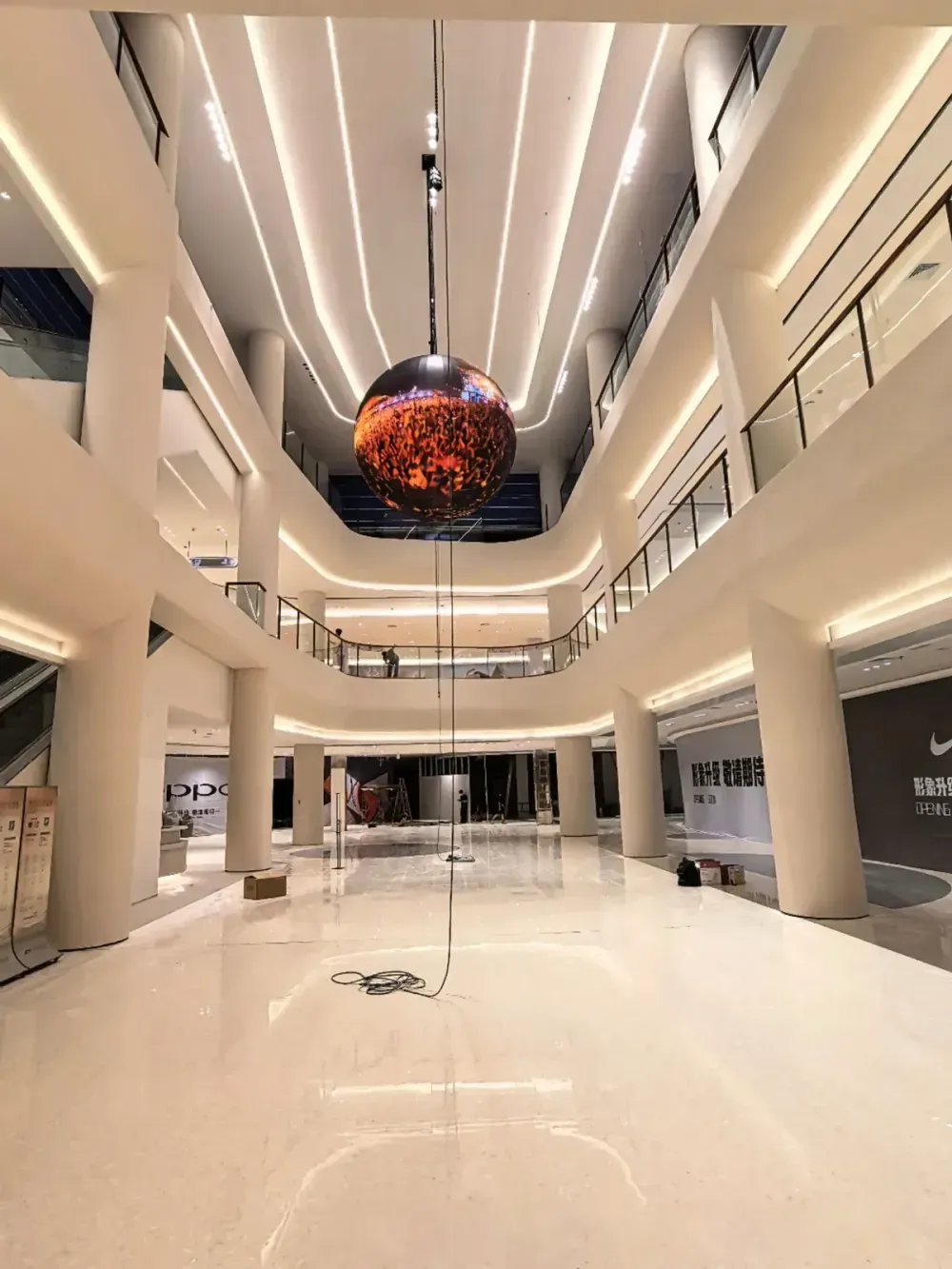 Full LED sphere suspended in a multi-level atrium